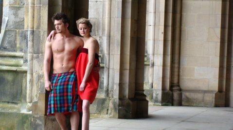 Student models John Kinnell and Lucy Simmonds previewing the recycled red gown collection (photo: Gayle Cook).
